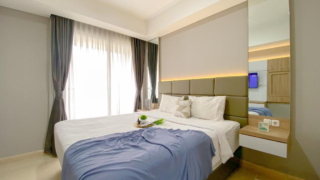 Nice and Restful Studio at Gold Coast Apartment By Travelio, Jakarta