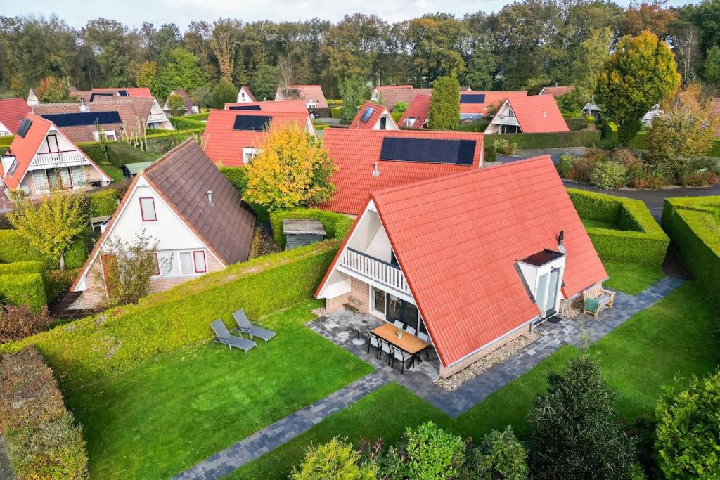 Buizerd I Huisje in Noordse Stijl met Tuin, Zwiggelte