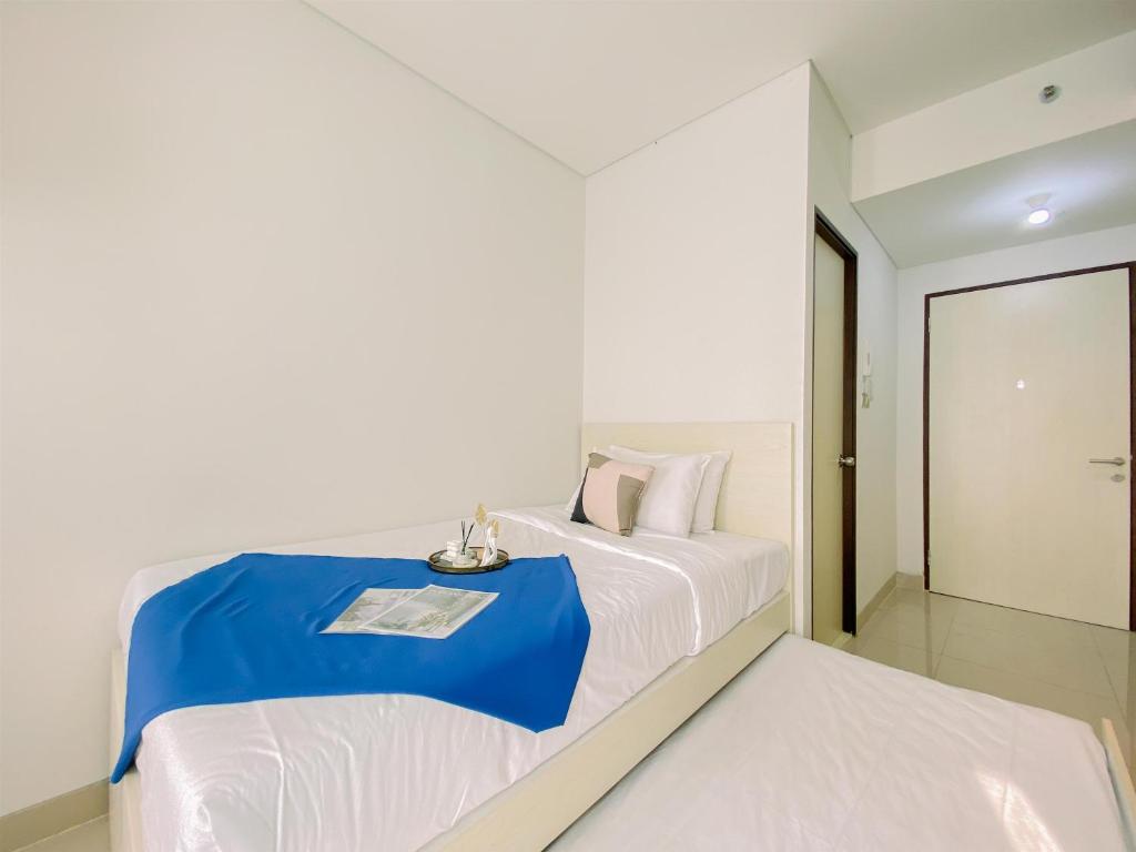 Good and Homey Studio Apartment at Transpark Cibubur By Travelio, Depok