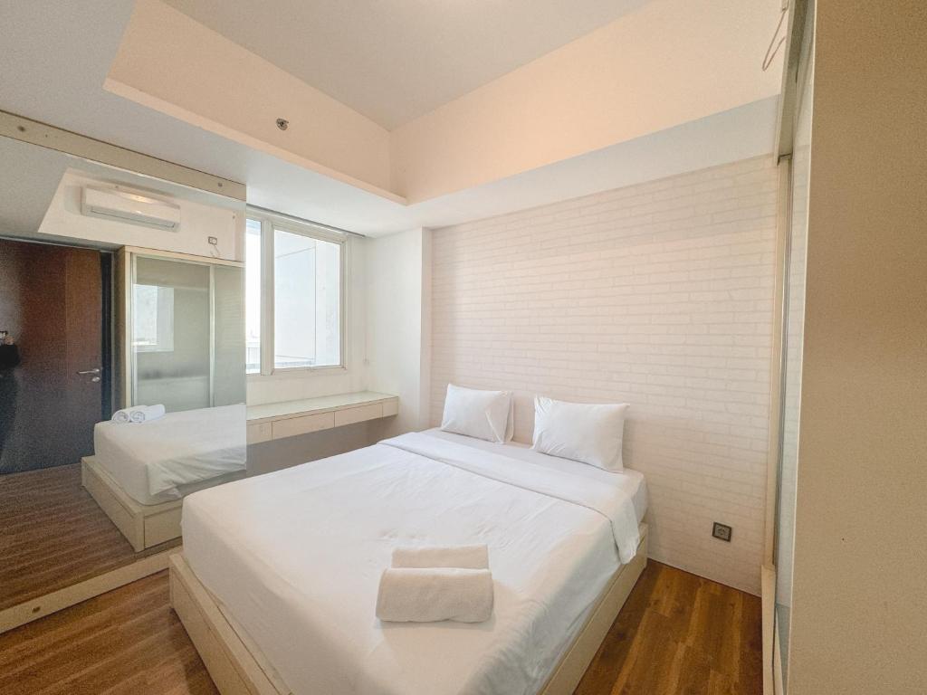 Good Location and Serene 2BR at Linden Apartment By Travelio, Surabaja