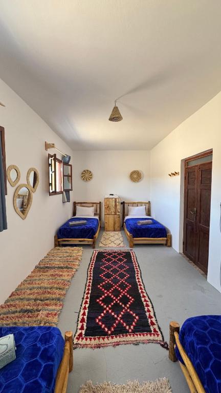 Quadruple room in fisherman house, Ouassane