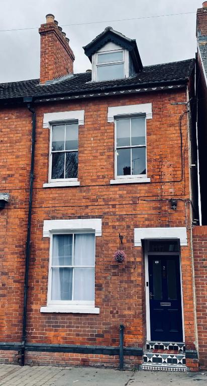 Victorian red-brick home in picturesque market town, Gloucestershire