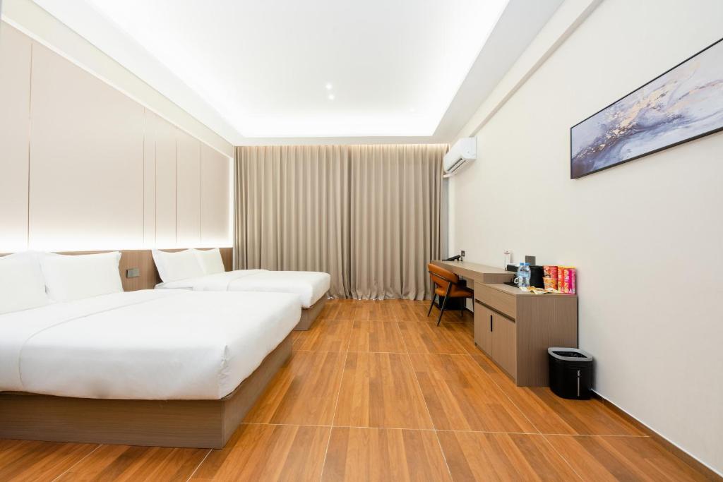 新骏龙酒店 객실 이미지