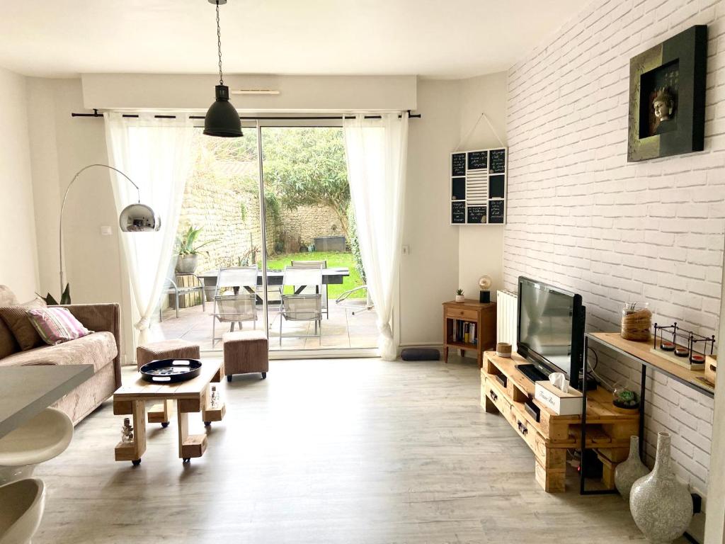 Appartement cosy avec jardin proche centre . - 1
