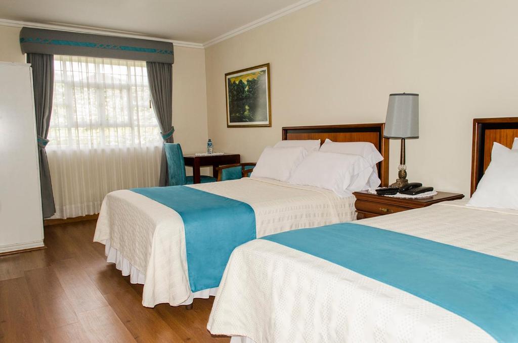 Habitación con camas individuales