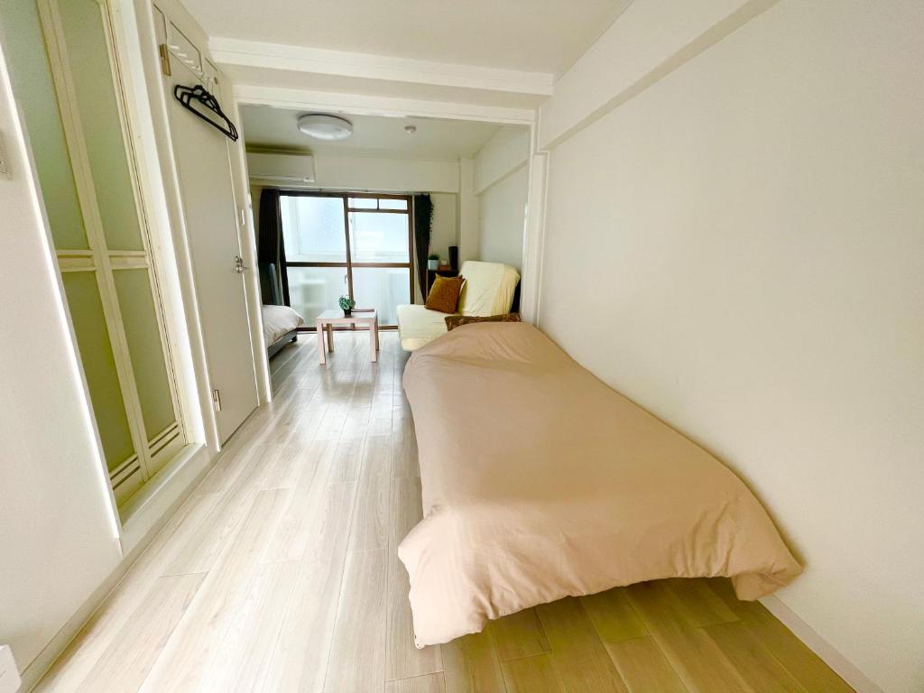 SUNRISE APT ワンちゃんといっしょにご宿泊可能 新大阪駅から徒歩5分観光都市へのアクセス抜群Simply Guest Room Shin-Osaka