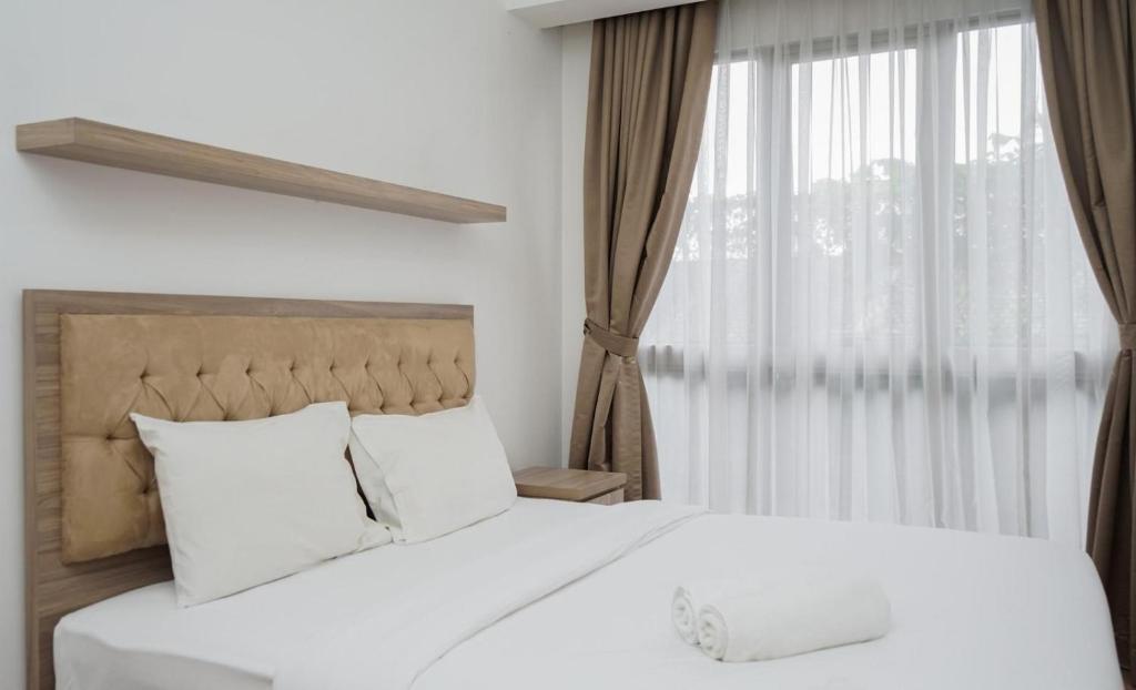 Comfortable and Simply 1BR at M-Town Signature Apartment By Travelio, Tangerang