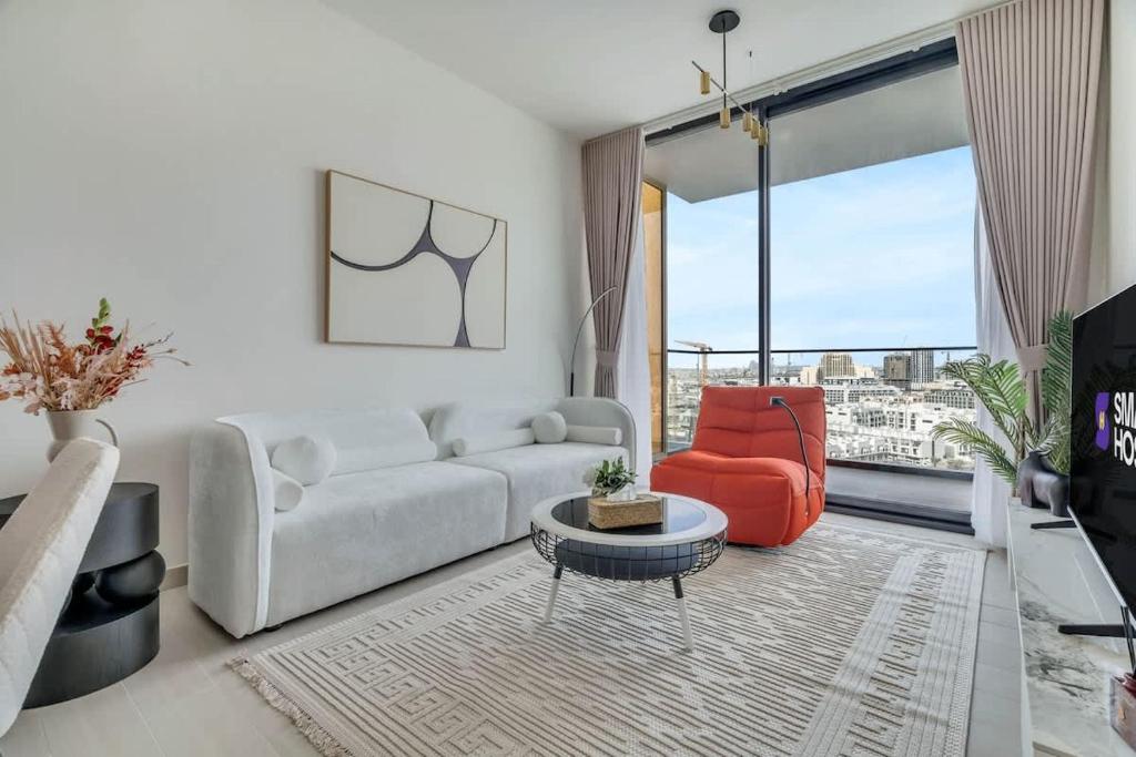 Exceptional 1BR flat wBalcony Gym & Pool in JVC, Dubaj