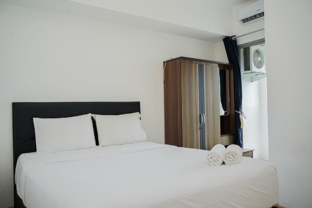 Restful and Cozy 2BR Apartment at M-Town Residence By Travelio, Tangerang