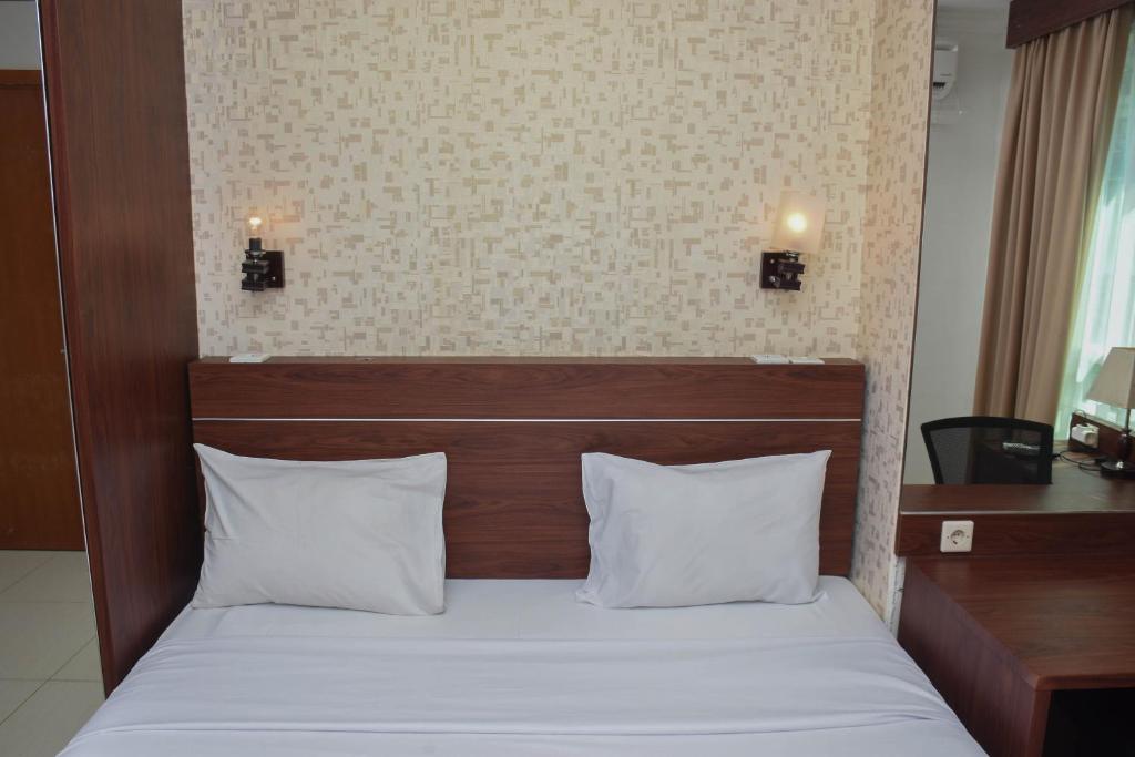 Great Location and Comfy 1BR Apartment at Woodland Park Residence By Travelio, Jakarta