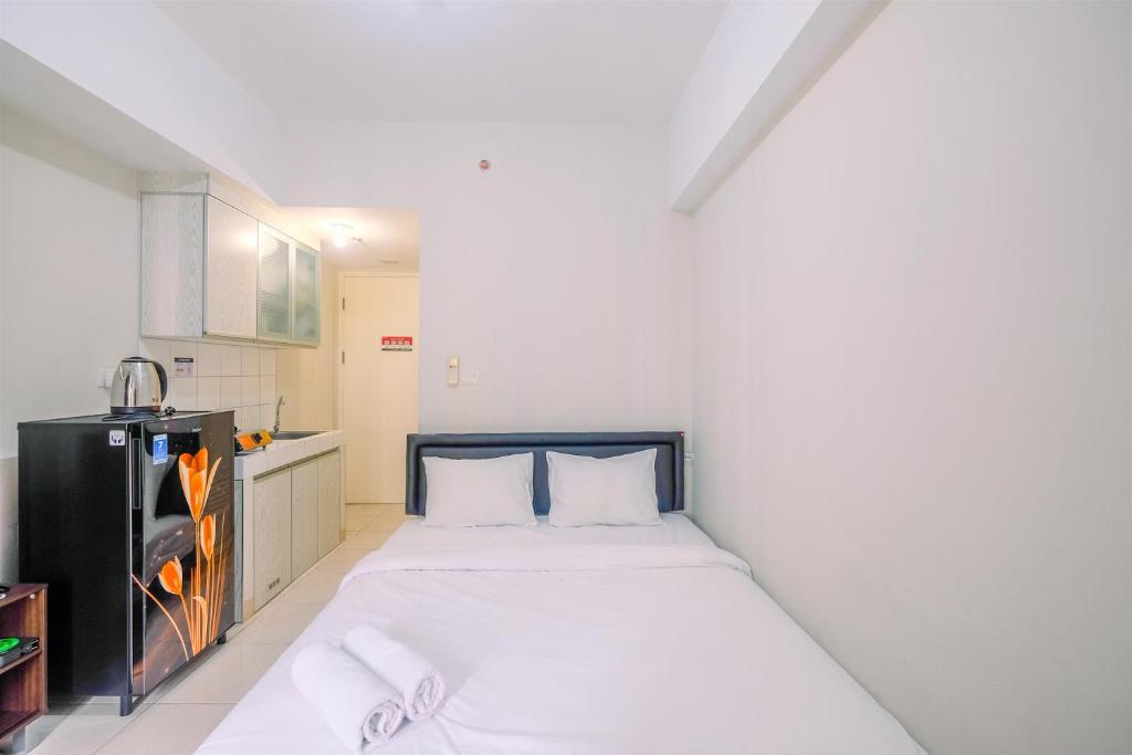 Simply Good Studio Room at Springlake Summarecon Apartment By Travelio, Bekasi