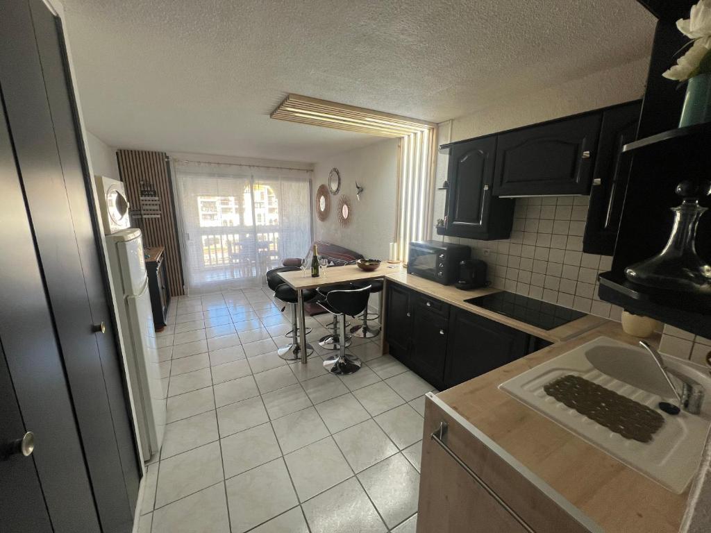 Appartement traversant de 39 m2 4 à 6 personnes, Le Barcarès