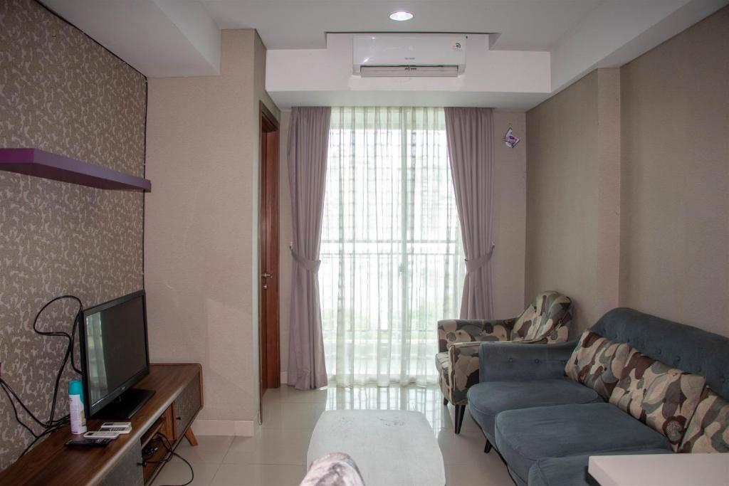Elegant and Comfy 2BR Apartment at Springhill Terrace Residence By Travelio, Jakarta