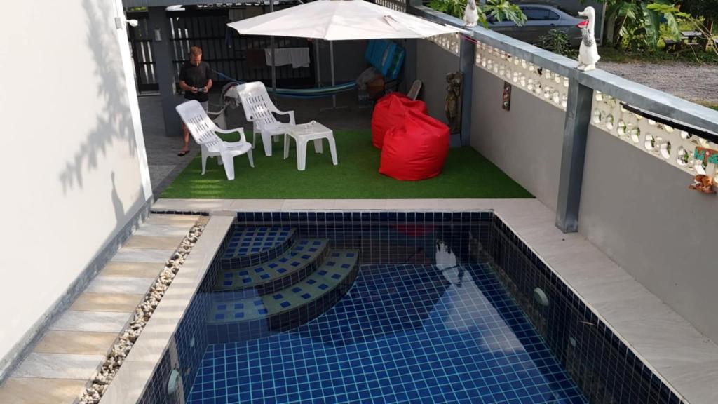 Swimming pool, Mountain View Guest House in Phatthalung