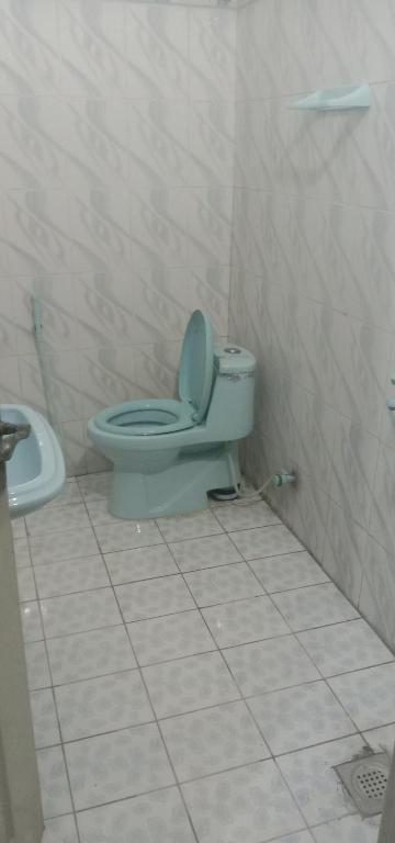 Gujrat Hotel의 아늑한 객실 내부