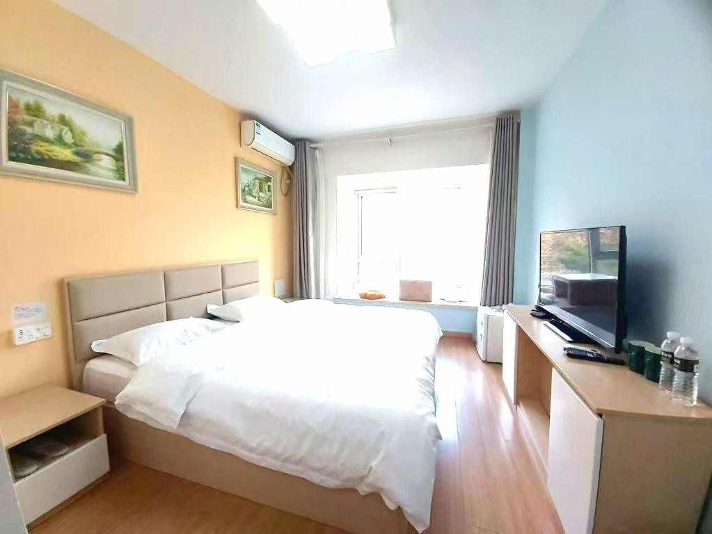 Qingdao Mi Apartment, Čching-tao