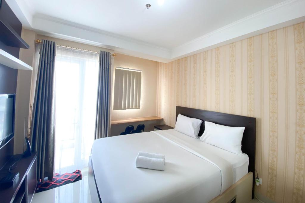 Best and Homey Studio at Signature Park Grande Apartment By Travelio, Jakarta