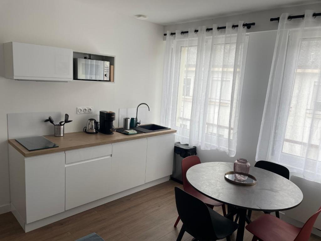 Appartement T2 - 202 - Hyper Centre - Intégralement rénové - Toutes commodités à pied - 4