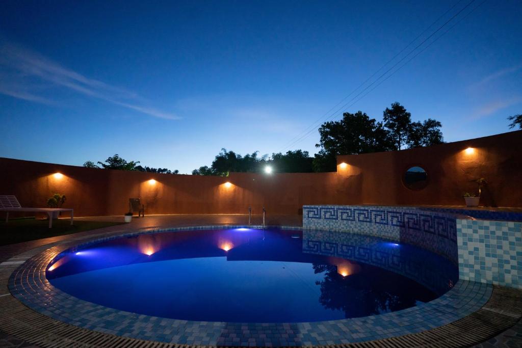 Swimming pool, Sunshine Farms And Resort in Umsning