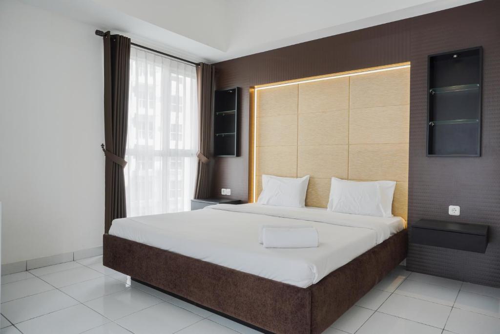 Elegant and Restful Studio at Casa De Parco Apartment By Travelio, Tangerang