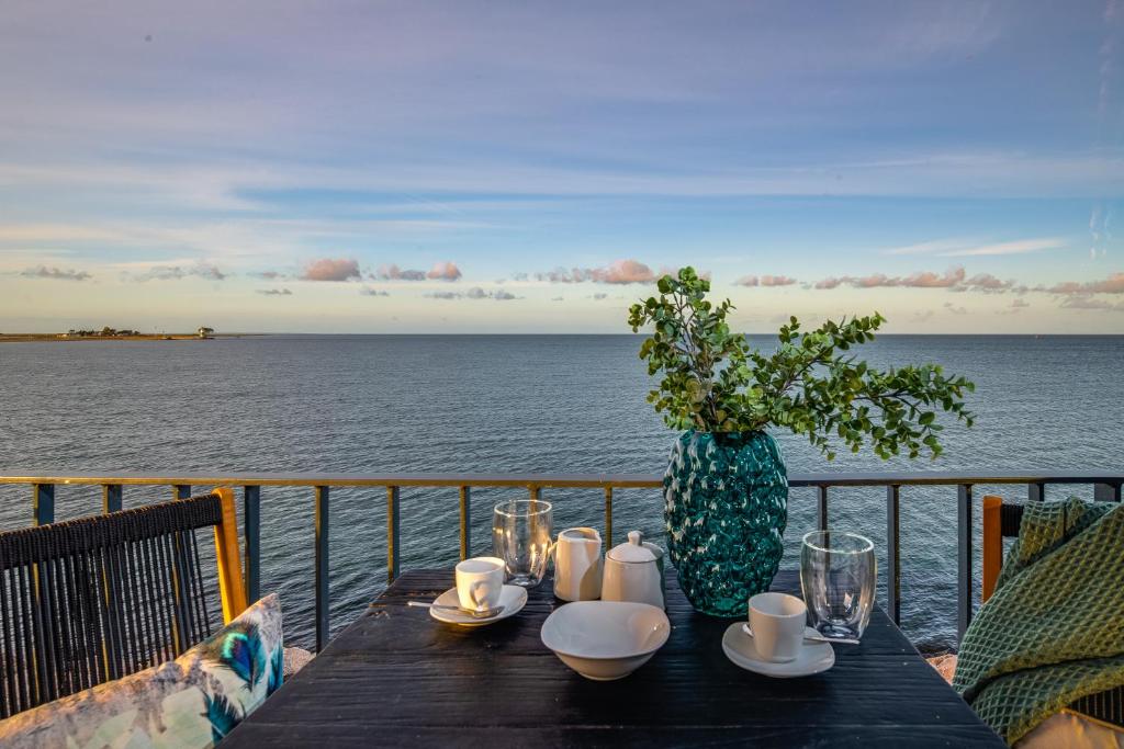 Strandfeder – Moderne Ostsee-Ferienwohnung für Drei im OstseeResort Olpenitz, Olpenitz