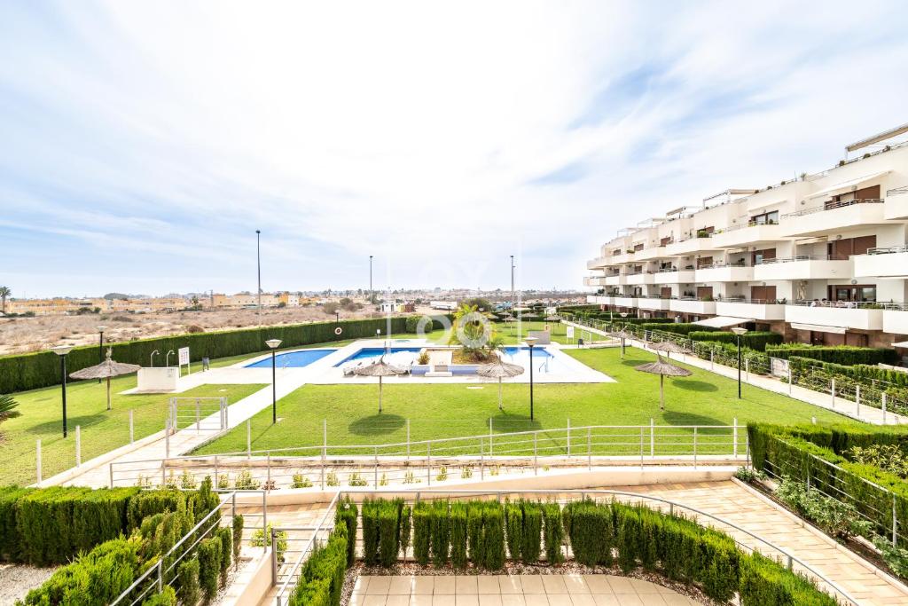 La Brisa del Mar apt with sea view, terrace, pool - by OYOOSTAYS - 1