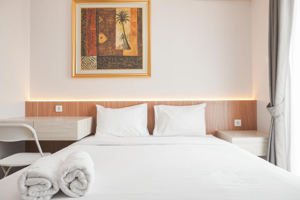 Comfortable and Minimalist Studio Apartment at Woodland Park Residence By Travelio, Jakarta