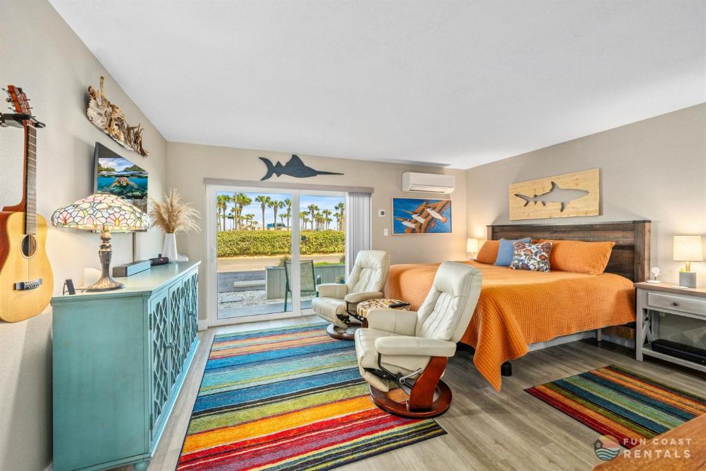 Vibrant and Colorful Studio STEPS from the Beach with Pool and Upgraded Kitchen!, Edgewater