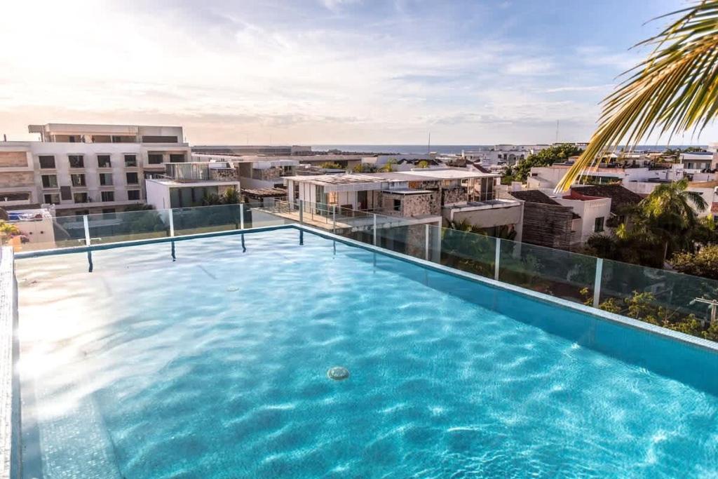A pasos de la playa | Apartamento elegante en la Quinta Avenida con piscina en la azotea - 4