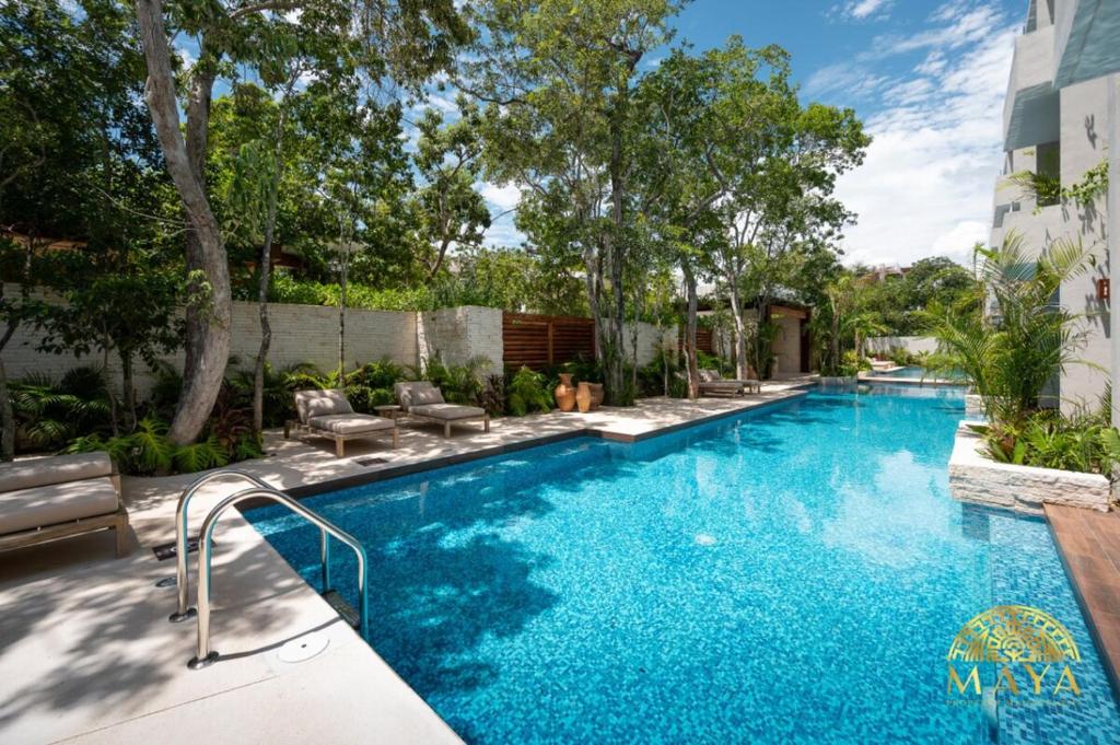 NHOA 203B Lux 1BR Condo Pool View in Aldea Zama - 3