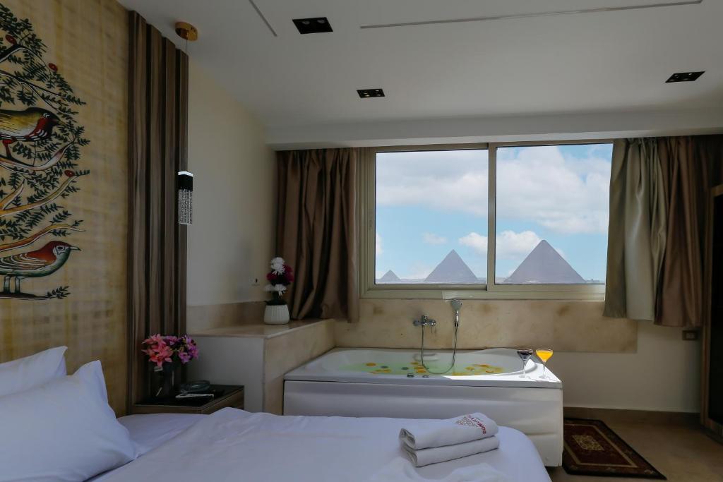 Pyramids View& Grand Museum With Jacuzzi On Eleven Floor & Roof Restaurant, Káhira