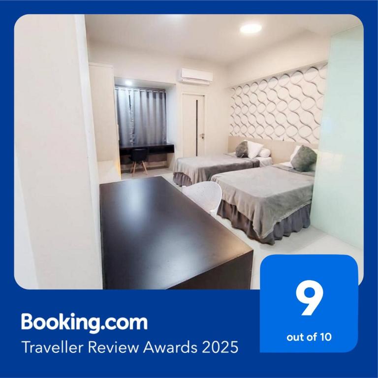 The Square Apartemen Service Twin Suite with WiFi NetFlix 50Inchi, Surabaja