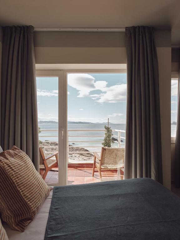 Beachfront view from Hotel Atlante Sanxenxo Boutique