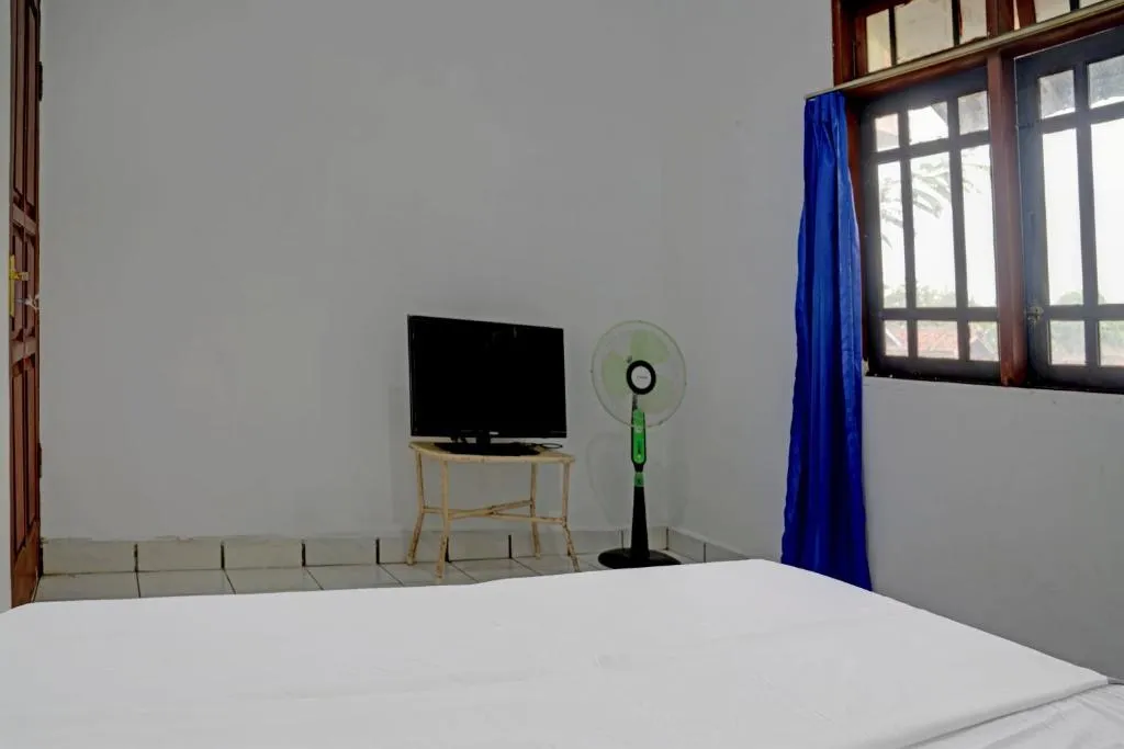SPOT ON 92856 Home Stay Syariah Aom Kusman，位于苏加武眉的酒店