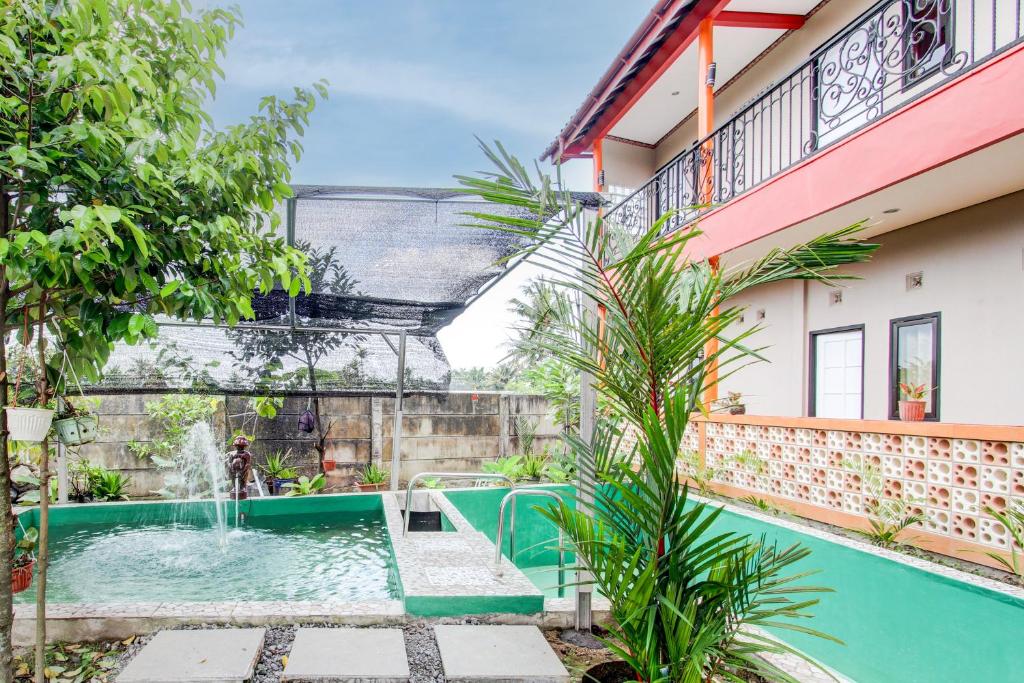 Capital O 93994 Dalem Kamulyan Syariah Guest House