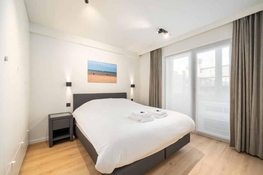 Luxe comfort app met zijdelings zeezicht en in centrum, Ostende