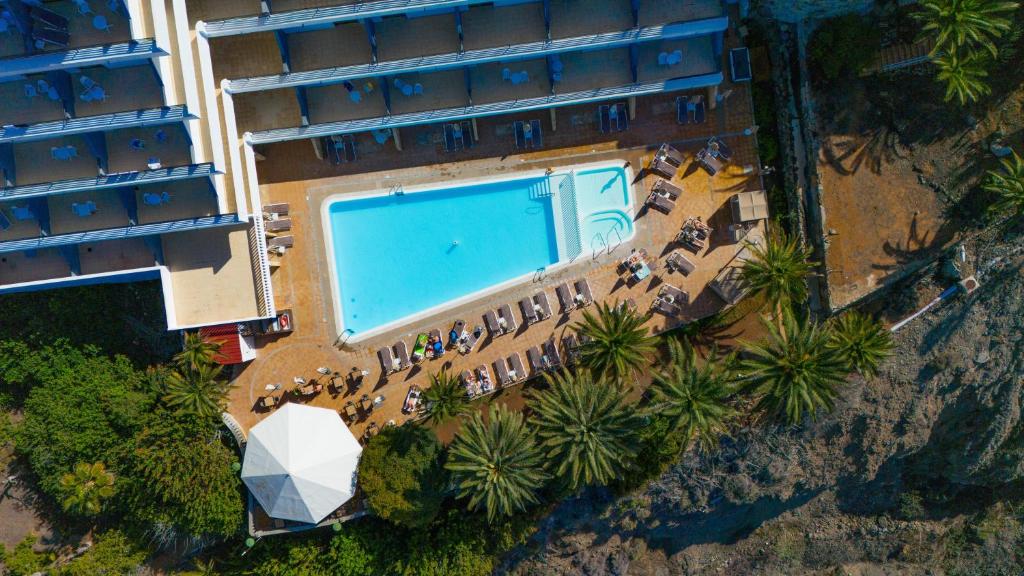Hotel Chatur Palmera Mar — Swimming pool in Puerto Rico, Canary Islands