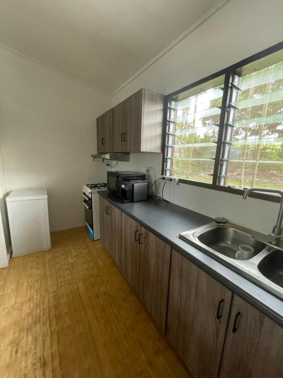 Kitchen, Olivias Accommodation in Apia