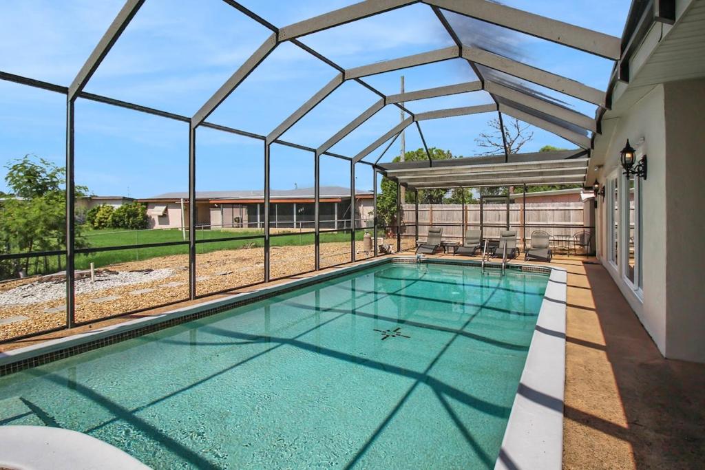 Canal-Front Escape with Private Pool & Game Room in Port Charlotte, Port Charlotte