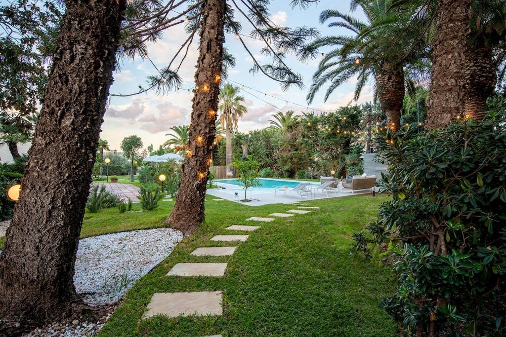 Numeroquattro-Light Green, Open Space con vista sul giardino e piscina - 1