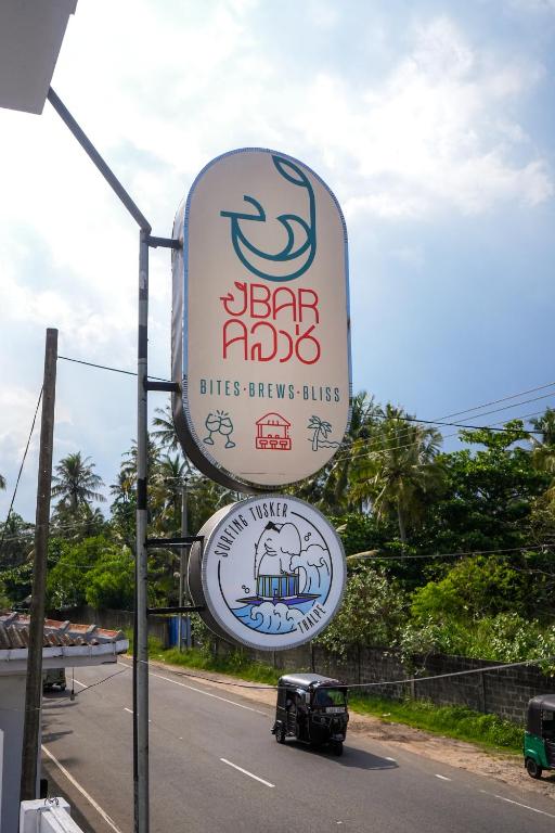 Surfing Tusker - Thalpe, Talpe