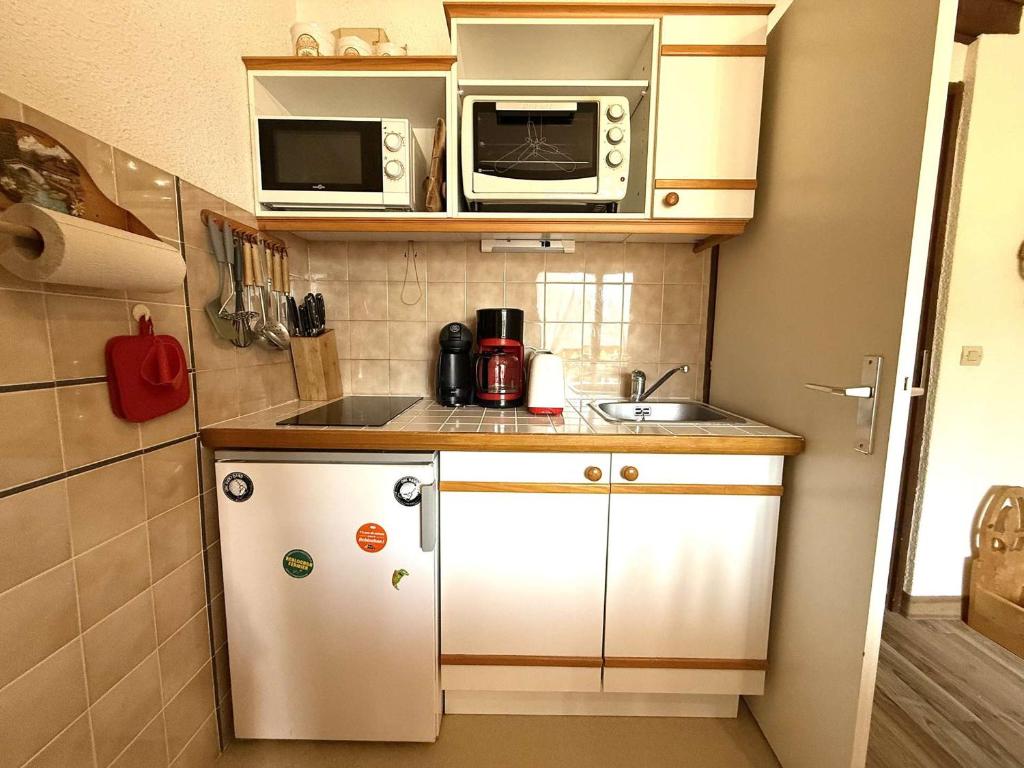 Appartement skis aux pieds avec balcon, parking et casier à ski à Praz-sur-Arly - 4