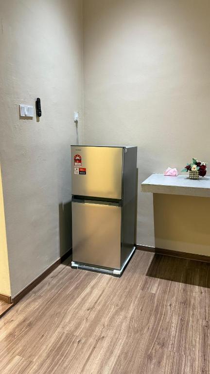 Cosy Nest Homestay with 60 inch 4K android TV, Muar