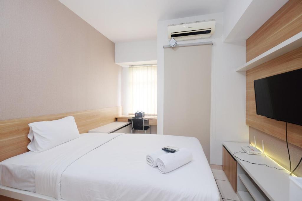 Modern Studio with Great Lake View at Springlake Summarecon Apartment By Travelio, Bekasi