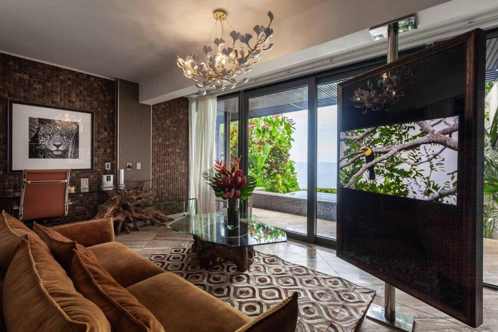 Shared lounge/TV area, Makanda by The Sea Hotel Adults Only in Quepos