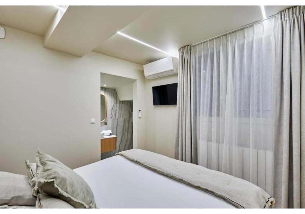 Apartment Le Marais place des Vosges by Studio prestige - 2