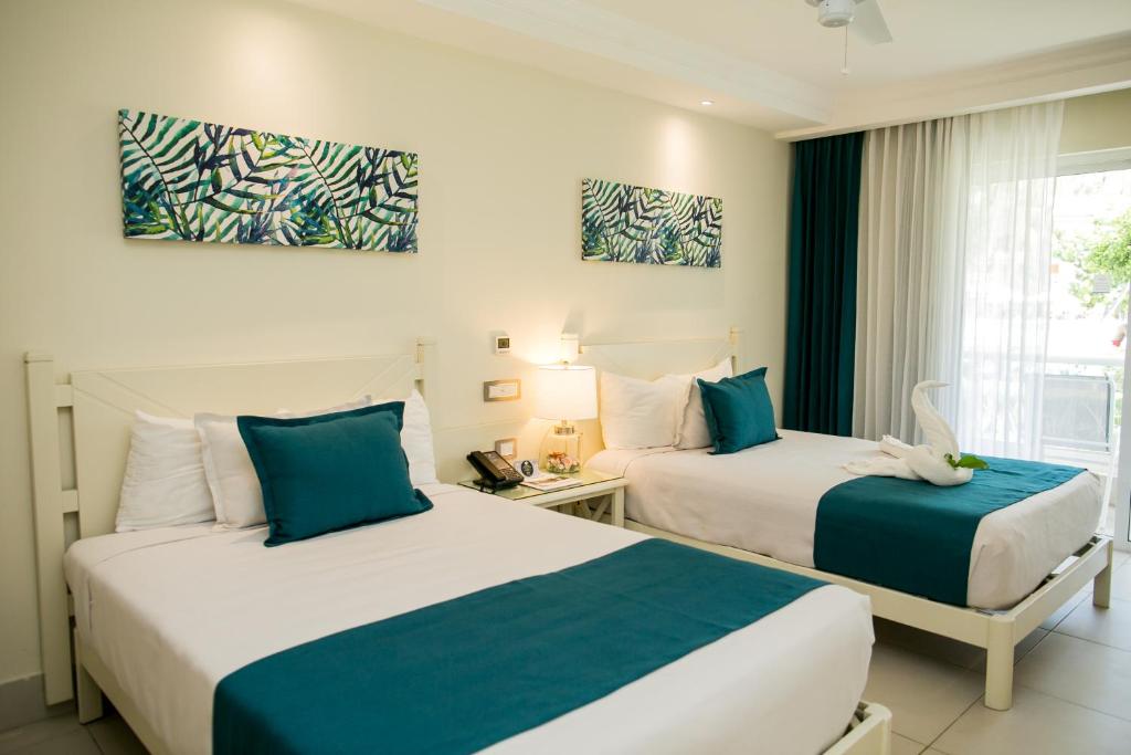 Vista Sol Punta Cana Beach Resort & Spa - All Inclusive — Hotel rooms in Bavaro, La Altagracia