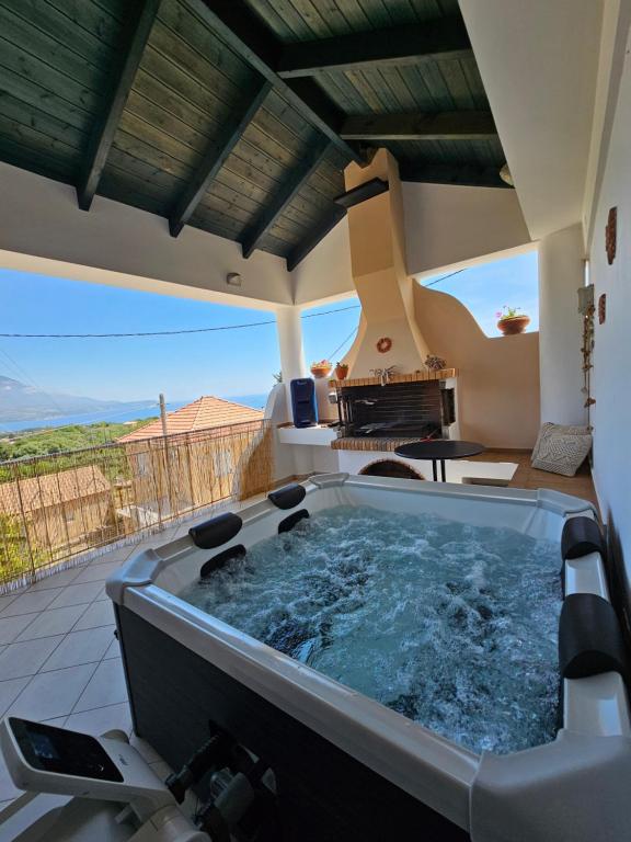 Marily's seaview suite with private JACUZZI and BBQ, Spartia