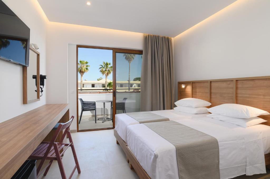 Pefkos Village Resort — Pokoje in Pefkos, Wyspy Egejskie Południowe