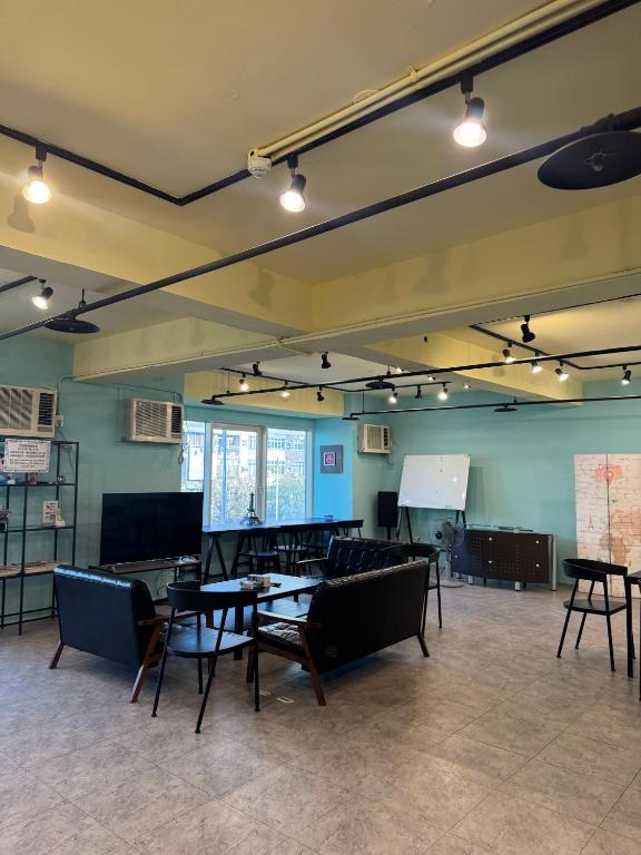 Shared lounge/TV area, Pathways Hostel in Kaohsiung
